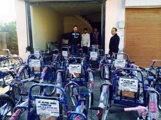 Distributed wheels chairs to Poor people