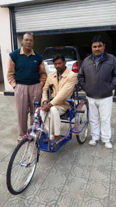 Distributed wheels chairs to Poor people