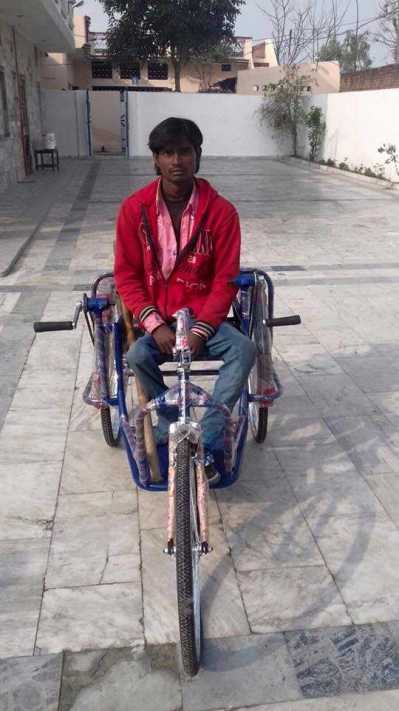 Distributed wheels chairs to Poor people