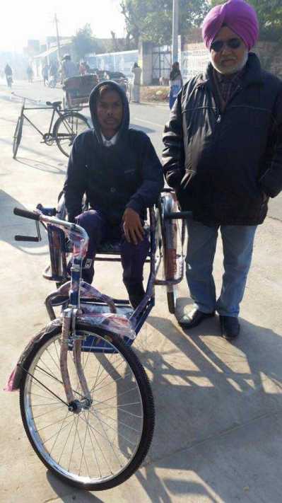 Distributed wheels chairs to Poor people