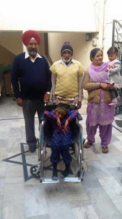 Distributed wheels chairs to Poor people