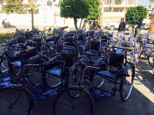 Distributed wheels chairs to Poor people