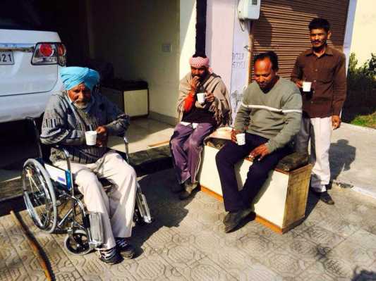 Distributed wheels chairs to Poor people