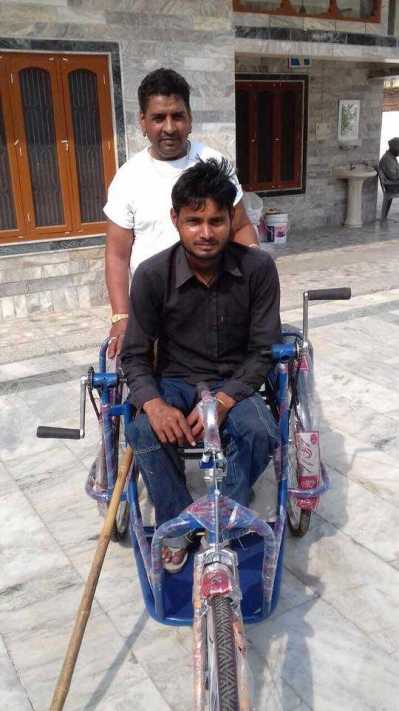 Distributed wheels chairs to Poor people