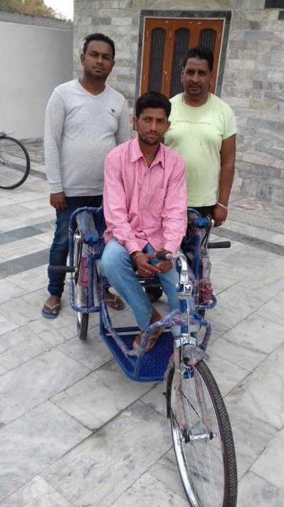 Distributed wheels chairs to Poor people